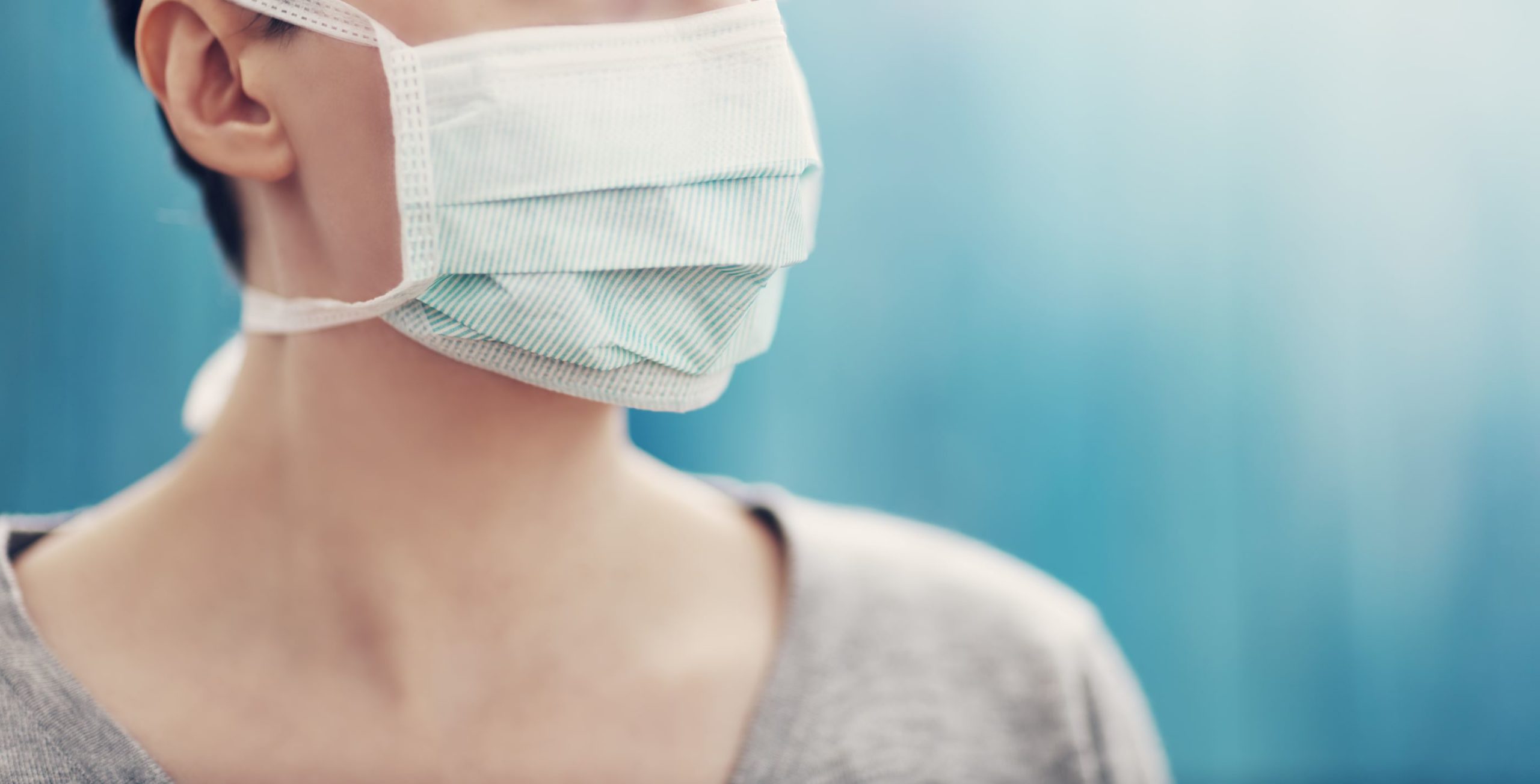 When it comes to the coronavirus, heart patients may be especially vulnerable to the symptoms. This image shows a woman wearing a face mask.